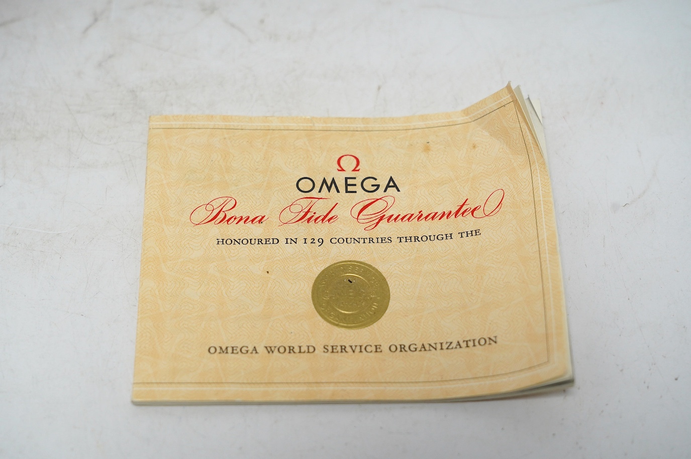 A gentleman's 9ct gold Omega manual wind wrist watch, no strap, case diameter 34mm, with Omega box. Condition - poor